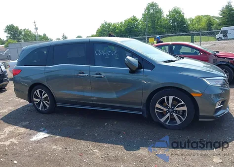 2019 Honda Odyssey Elite z USA, uszkodzony, nr VIN 5FNRL6H97KB094676
